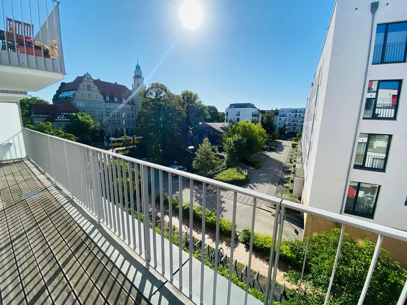 Wasserblick inklusive: 2 Zimmer mit Einbauküche, Fußbodenheizung & Terrasse — photo 1